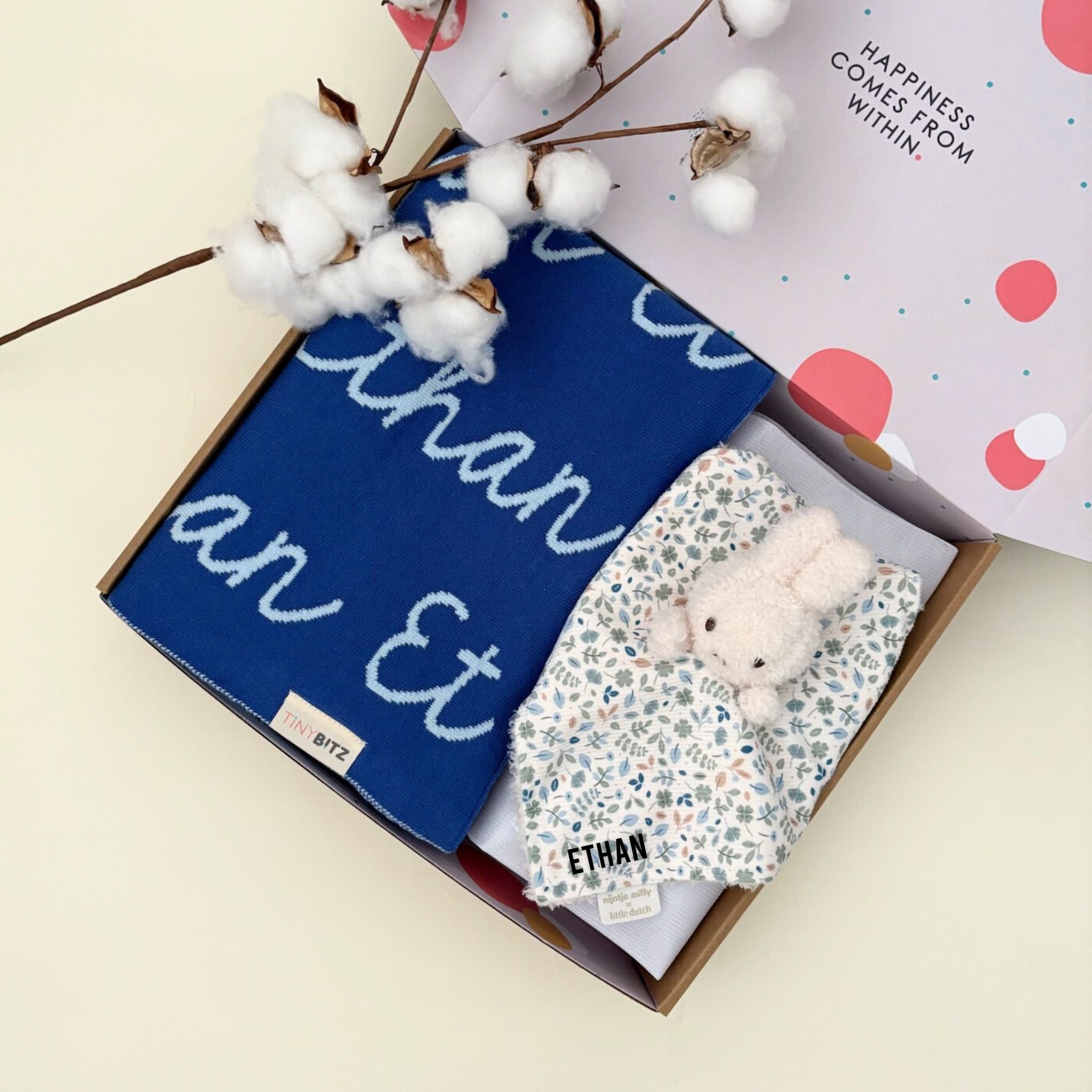 Gift bundle featuring a personalised knitted name blanket by TinyBitz and Miffy cuddle cloth with embroidered name, a thoughtful baby shower or newborn gift set.