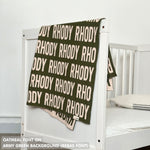 Cotton baby blanket with baby's name knitted in army green and oatmeal, made by TinyBitz.