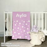 Knitted baby blanket in light purple and white with a dot pattern, customised with baby's name, made by TinyBitz