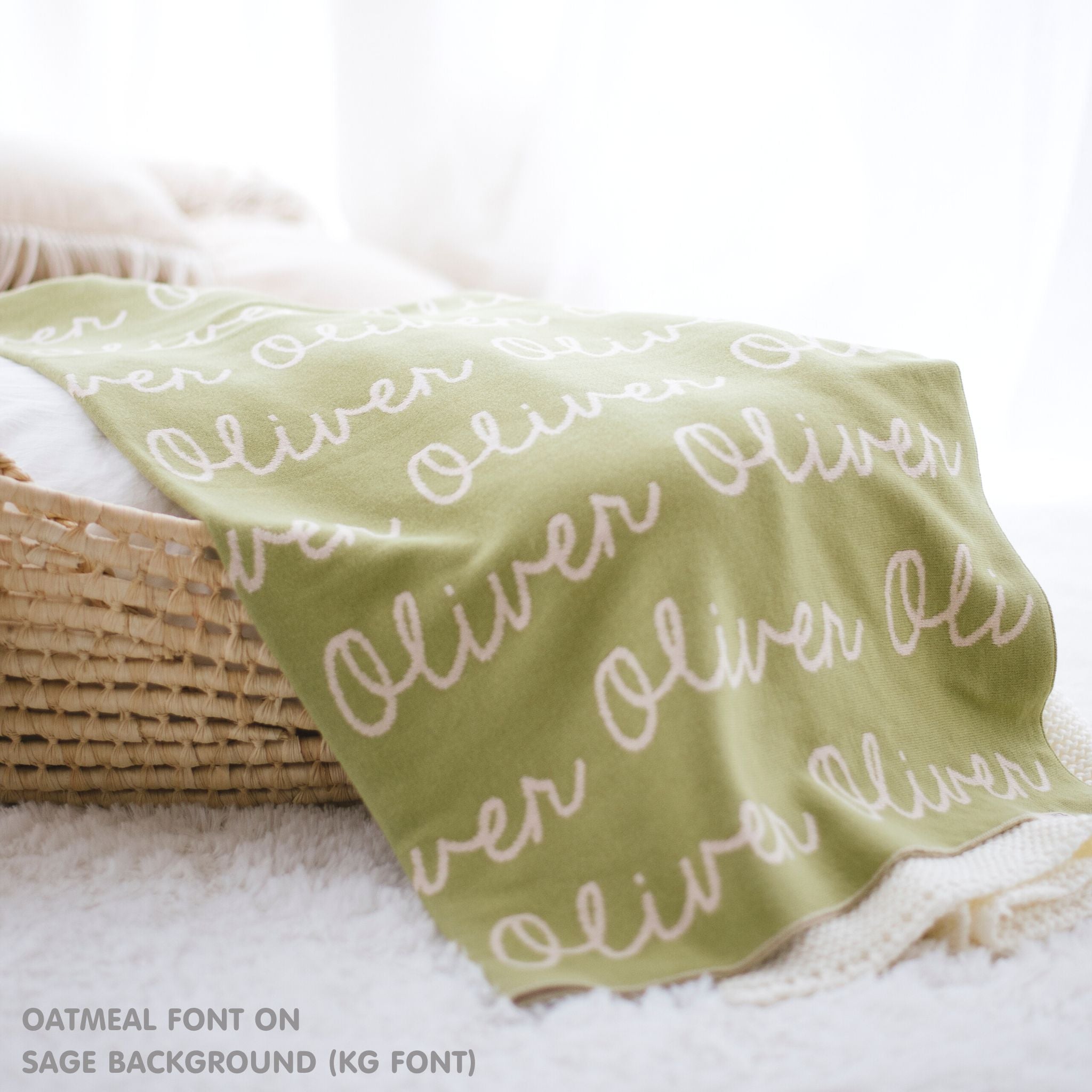 TinyBitz personalized knitted blanket in sage background, customized with baby's name and made from 100% cotton.