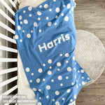 Knitted baby blanket in sky blue and white with a dot pattern, customised with baby's name, made by TinyBitz.