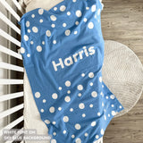 Knitted baby blanket in sky blue and white with a dot pattern, customised with baby's name, made by TinyBitz.