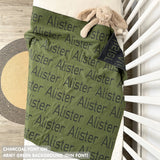 Knitted Children blanket in army green and charcoal, customised with kid's name, made by TinyBitz.