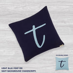 Personalised cushion with initial t in navy and light blue font, knitted cotton cushion by TinyBitz, custom baby and kids gift.