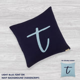 Personalised cushion with initial t in navy and light blue font, knitted cotton cushion by TinyBitz, custom baby and kids gift.